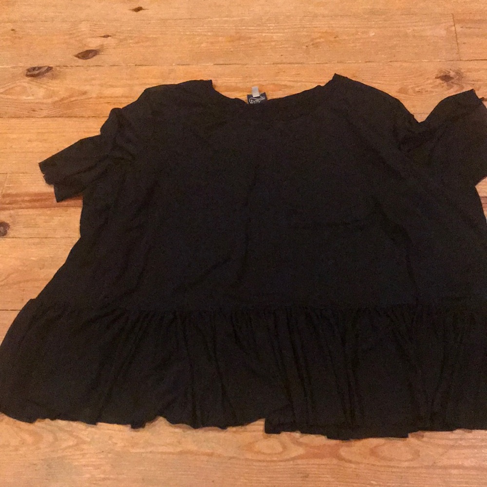Como vintage black over black knit.